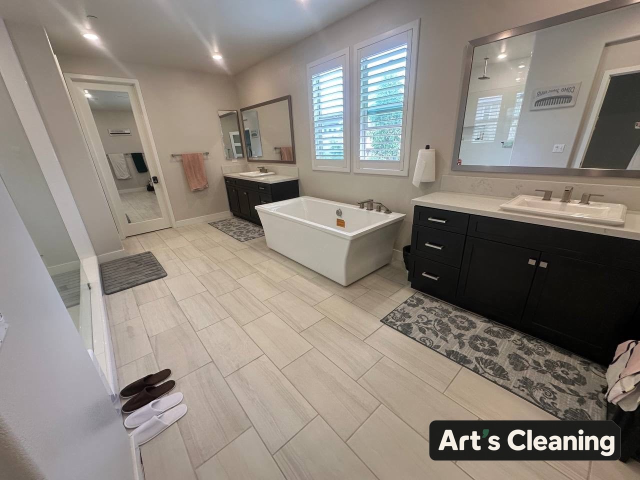 Freestanding bathtub and bathroom after cleaning