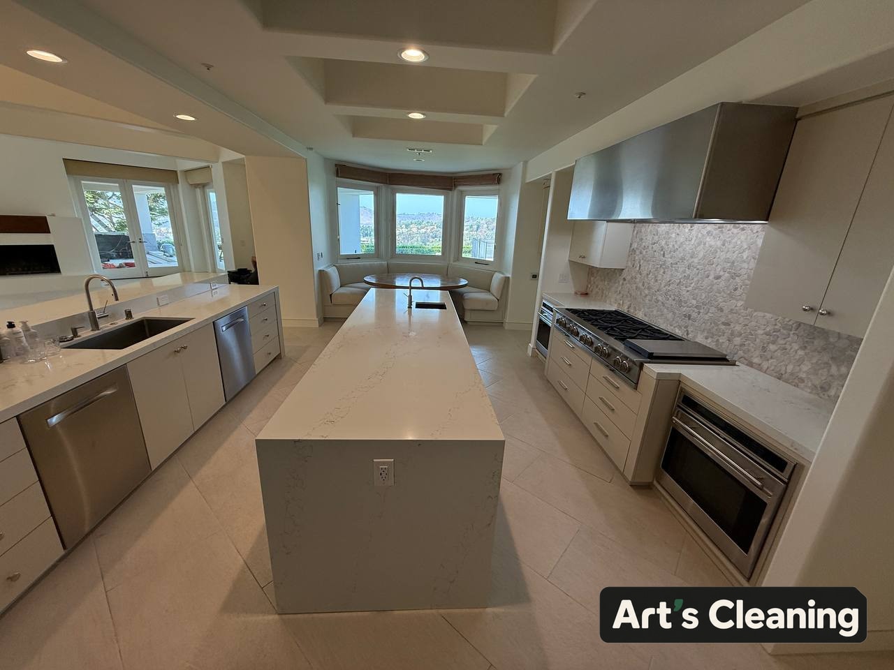 Modern kitchen island and counters after cleaning